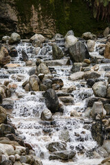An artificial waterfall in Beykoz, Istanbul. Artificial waterfall with stones and rocks. Landscape design idea concept. 