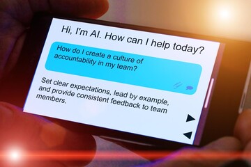 How do I create a culture of accountability in my team? Questions for artificial intelligence On the smartphone screen.