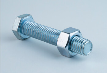 Steel bolt and nut on a white background