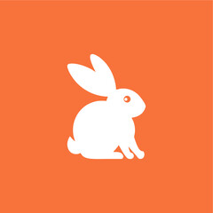 White silhouette of a rabbit on an orange background.