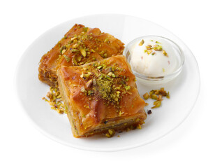 Tasty baklava with chopped nuts and scoop of ice cream isolated on white