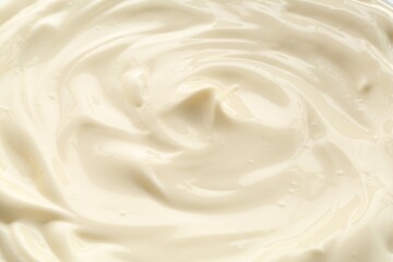 Delicious mayonnaise sauce as background, closeup view