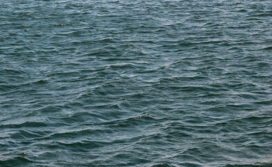 Ripple water surface, green color natural background