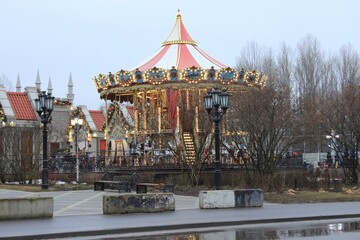 Children's two-story carousel. City park. Moscow. Russia.