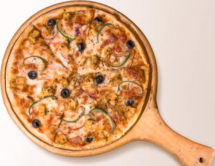 Pizza with mushroom and olive on white background, top view. Pizza with olive, Peppers, and Mozzarella Cheese close up.
