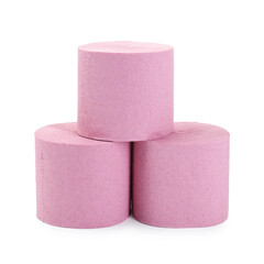 Pink toilet paper rolls isolated on white
