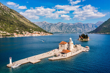 Saint George Island and Church of Our Lady of the Rocks in Perast, Montenegro. Our Lady of the Rock island and Church in Perast on shore of Boka Kotor bay (Boka Kotorska), Montenegro, Europe.