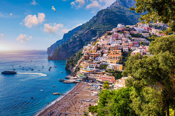 View of Positano with comfortable beach and blue sea on Amalfi Coast in Campania, Italy. Positano...