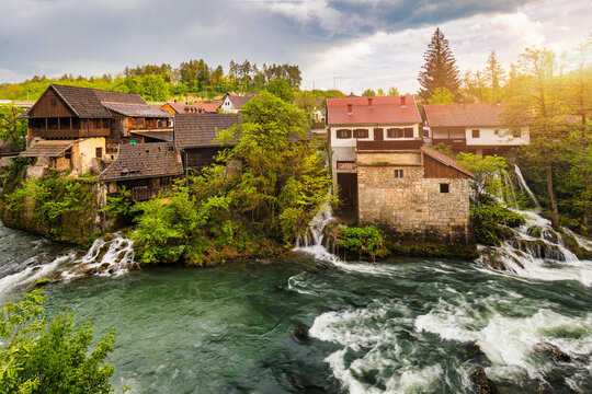 Village of Rastoke near Slunj in Croatia, old water mills on waterfalls of Korana river, beautiful countryside landscape. Landscape with river and little waterfalls in Rastoke village, Croatia.