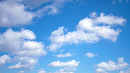 Blue sky pastel with white cloud. Cumulus clouds. Cloudscape blur background. Beautiful sky in the morning. Freedom of life, New life beginning and Positive thought and energy concepts.