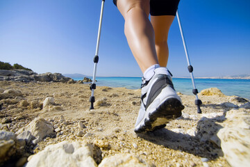 Nordic walking on the coast of the island