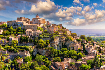 View on Gordes, a small typical town in Provence, France. Discover the stunning hilltop village of Gordes in Provence. Ancient hilltop village of Gordes, Provence, France.