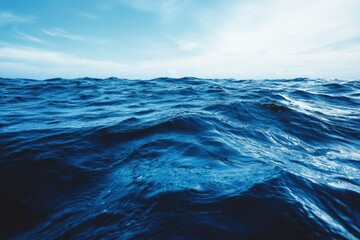 Fototapeta premium Vast ocean waves, horizon view, bright sunny day, nature background for travel