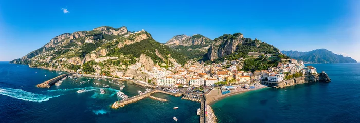 Fotobehang View of beautiful Amalfi town, Campania, Italy. Amalfi coast is most popular travel and holiday destination in Europe. Amalfi cityscape on coast line of mediterranean sea, Amalfi coast, Italy. © daliu
