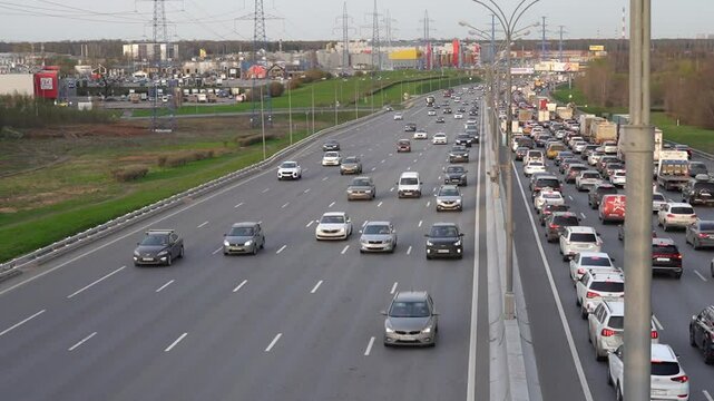 Moscow May 19 2024, Moscow MKAD evening in summer. heavy traffic on a busy highway.