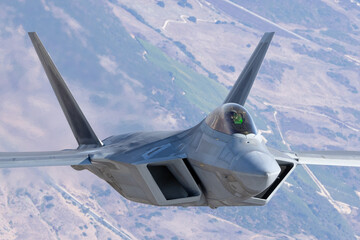 Close frontal view of a F-22 Raptor  over South California