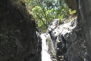 waterfall in the forest of Arusha National Park Tanzania wallpaper