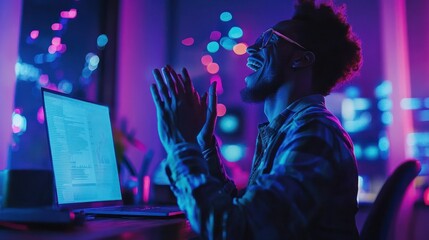 Joyful Programmer Celebrating Success Under Neon Lights