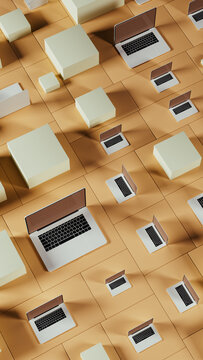 Modern technology arrangement with laptops and geometric shapes