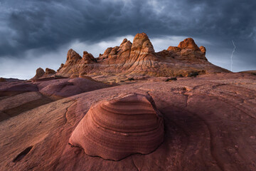 Dramatic storm clouds over Coyote Buttes rock formations