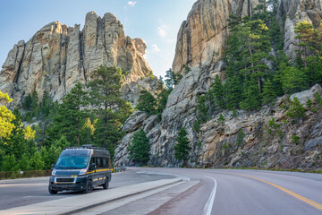 Early morning at backside of Mount Rushmore with George Washington and Class B RV van