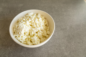cottage cheese in white bowl on kitchen counter