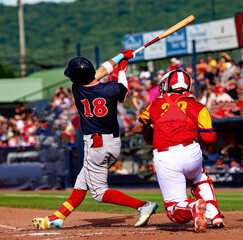 baseball player #18 and catcher