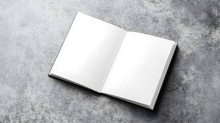 Fototapeta premium Open blank book with white pages lying on a textured gray concrete background, ready for writing, sketching, or designing. Minimalistic concept for creativity, education, and planning. Copy space