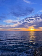 Sea waves and sunset sky clouds 