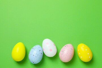 Happy Easter. Colorful eggs on color background, space for text or advertising