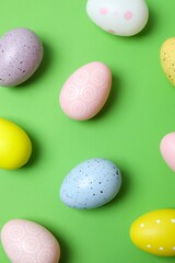 Happy Easter. Colorful eggs on color background, space for text or advertising