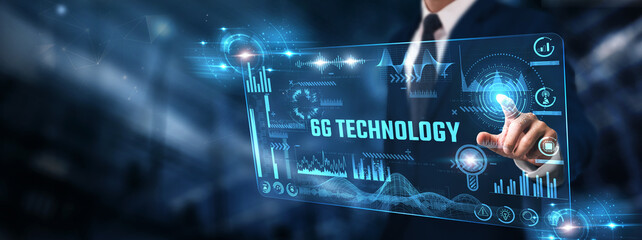 6G Technology: Businessman analyzing digital screen of graph data and ultra-fast connectivity, AI...