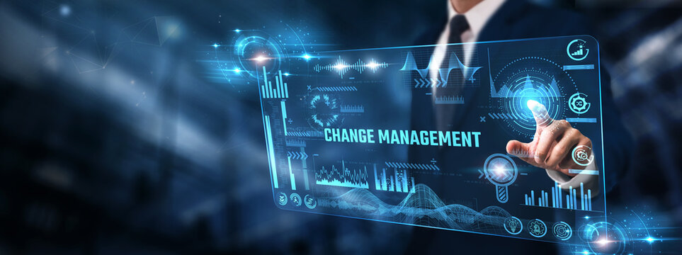 Change Management: Businessman analyzing digital screen of graph data and organizational transformation, process optimization, stakeholder engagement, risk assessment, and strategic planning.