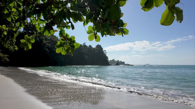 Sparkling blue ocean, paradise beach in Costa Rica. Manuel Antonio Beach, 