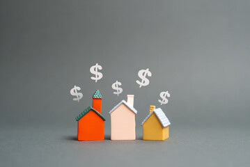 House figures and dollar symbols. Buying and selling real estate. Rent. Market trends, housing...