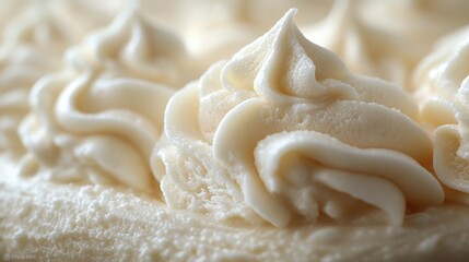 A detailed shot of a cake with white frosting, ideal for use in food photography or as a decorative element
