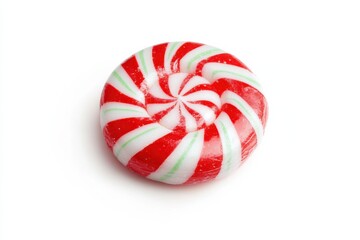 Festive red and white peppermint swirl candy resting on a bright white background in wintertime isolated on transparent background