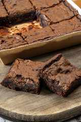 American chocolate brownie, dark chocolate baked dessert bar fudgy or cakey sweet dessert