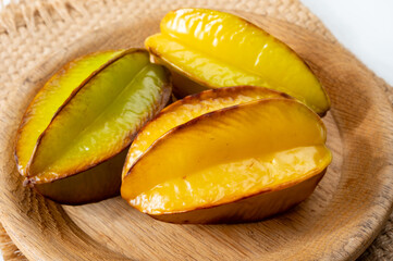 Ripe fresh averrhoa carambola or star fruits on board