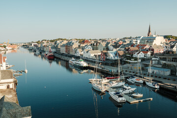 View of the old town of the Norwegian city of Haugesund from the bridge in the sunshine.