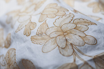 White cloth drawn with wax, one of the initial stages in making hand-drawn batik