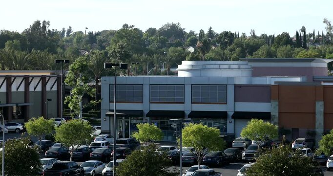 Trees frame the urban core of downtown Chino Hills, California, USA.