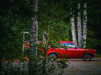 red car on a road