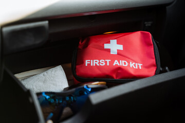 An essential first aid kit is located conveniently in the cars glove box to ensure easy access in...