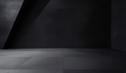 A minimalist interior space featuring dark walls and a gray floor with angular lines, creating a dramatic and modern atmosphere.
