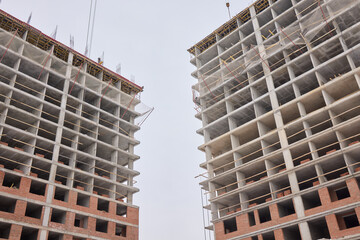 Urban Construction A Modern Building is Under Development in the Cityscape Area Nearby