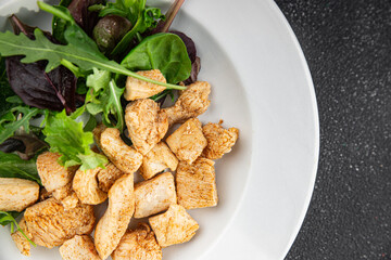 Salad turkey meat green leaves mix fresh delicious gourmet food background on the table rustic food top view copy space keto and paleo diet