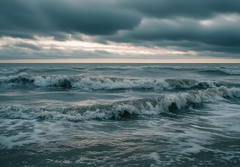Fototapeta premium Serene Ocean Waves Under Dramatic Cloudy Sky at Dusk, Capturing the Tranquility of Nature's Seascape and the Rhythm of Water Movement