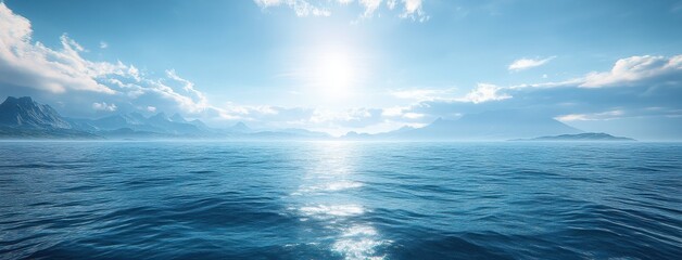 Serene Seascape Under Bright Blue Sky with Gentle Waves and Distant Mountain Ranges on the Horizon Evoking Tranquility and Natural Beauty