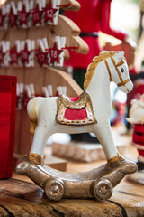 wooden rocking horse on wooden background